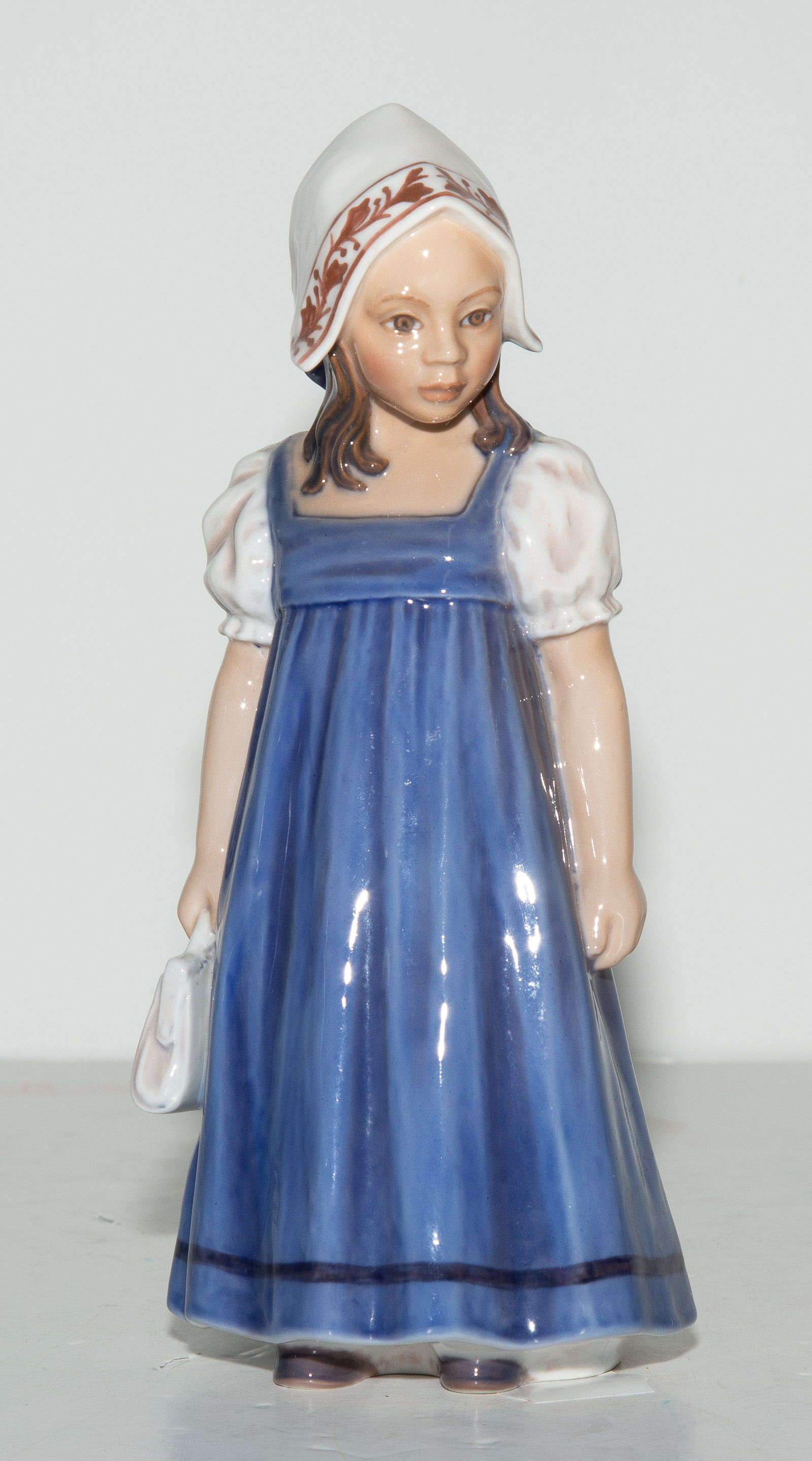 Appraisal: DAHL JENSEN COPENHAGEN PORCELAIN FIGURE Girl with handbag labeled Hanne