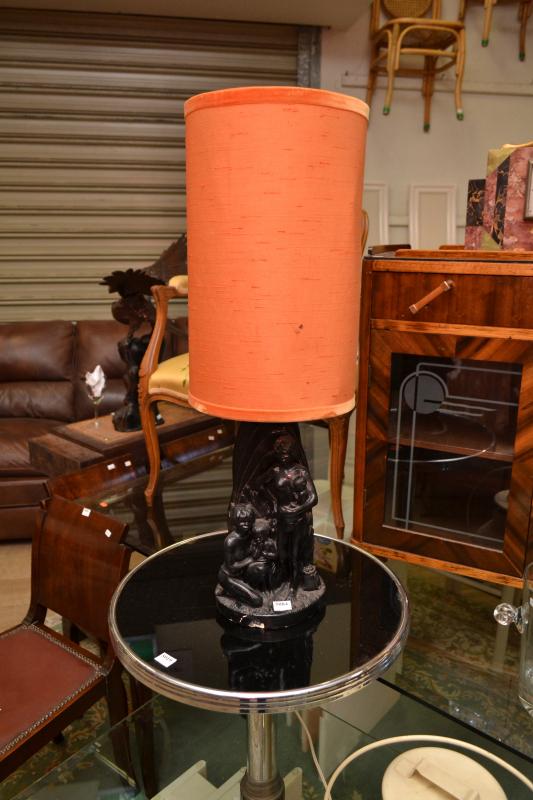 Appraisal: AN AUSTRALIAN PLASTER LAMP BASE WITH ORANGE SHADE AN AUSTRALIAN