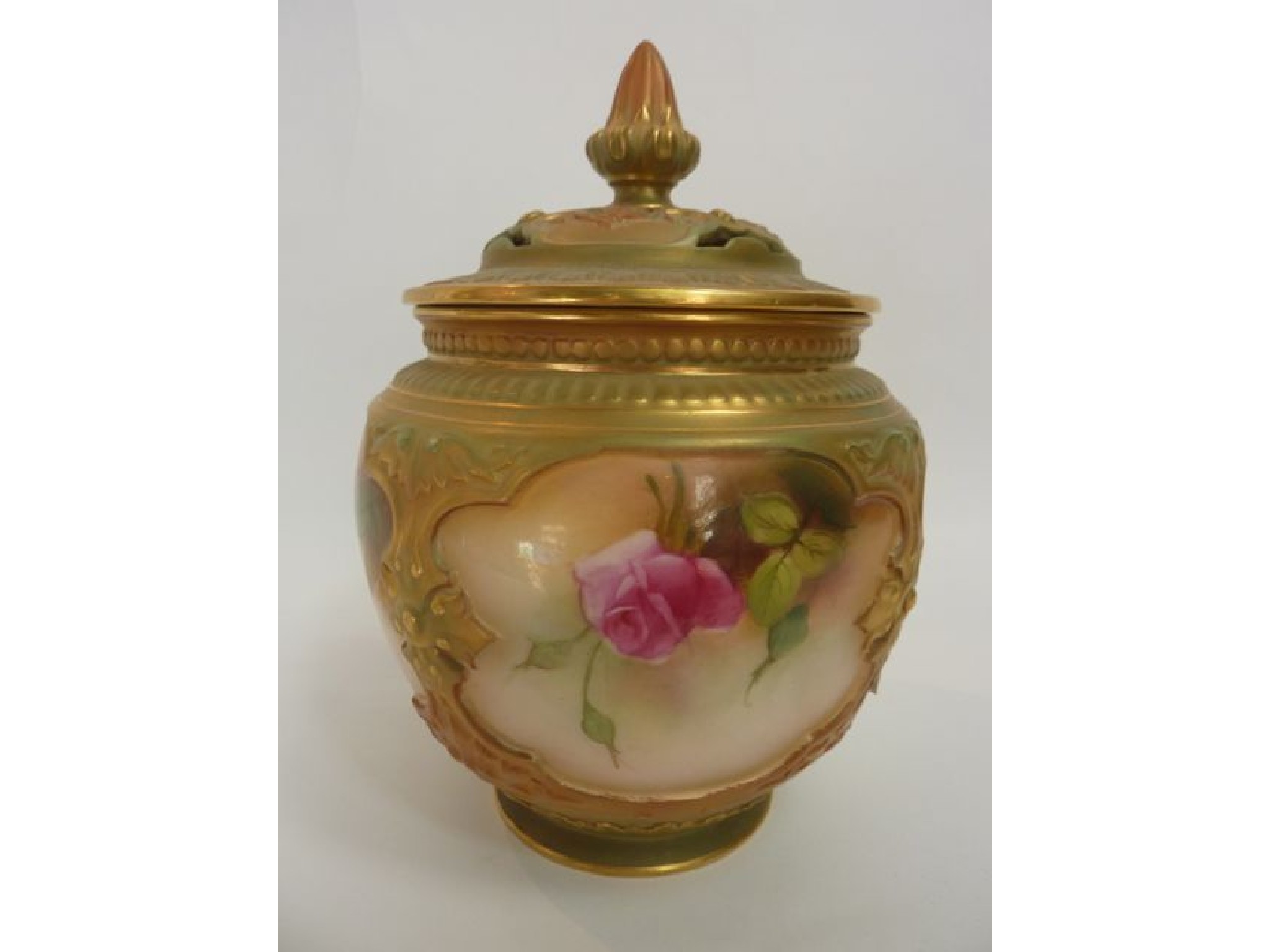 Appraisal: A Royal Worcester pot pourri vase and cover with four