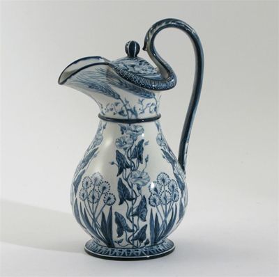 Appraisal: An Arts and Crafts pottery ewer and cover by Albert