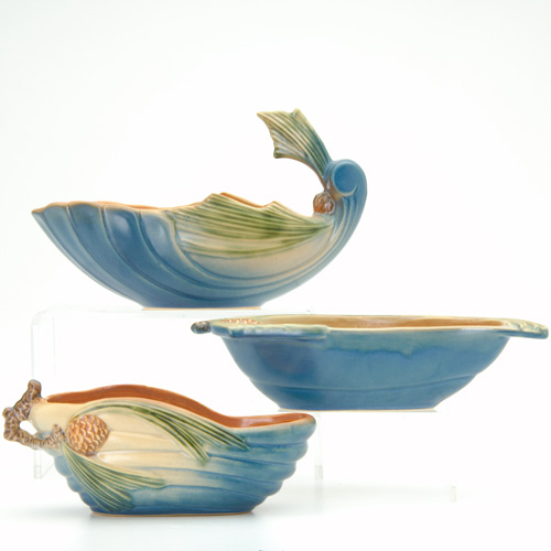 Appraisal: ROSEVILLE Three blue Pine Cone bowls - - and -