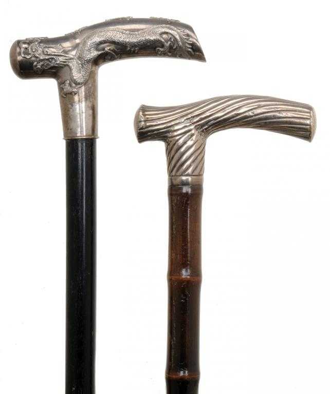 Appraisal: A CHINESE EXPORT SILVER-MOUNTED EBONY WALKING CANE the tau handle