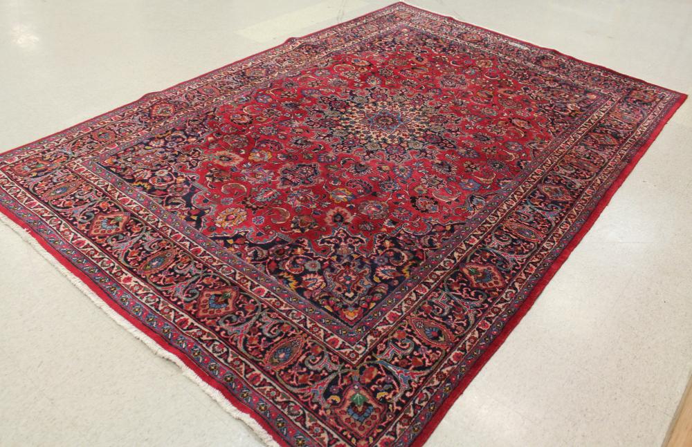 Appraisal: SIGNED SEMI-ANTIQUE PERSIAN CARPET floral and central floral medallion design