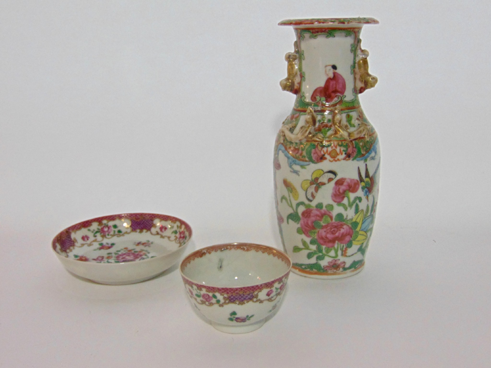 Appraisal: An early th century tea bowl and saucer with Famille