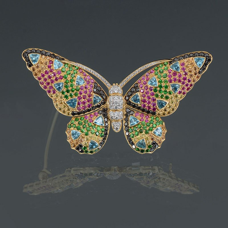 Appraisal: ELI FREI K MULTI-COLOR GEMSTONE BUTTERFLY BROOCH London born Eli