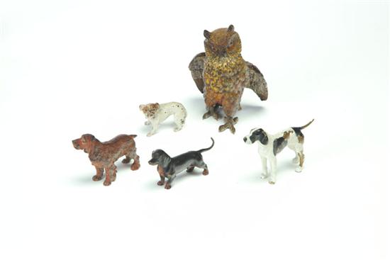 Appraisal: FIVE DOG AND OWL FIGURINES Austria late th-early th century