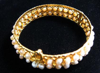 Appraisal: Eastern Indian themed pearl and yellow gold bracelet Fresh water