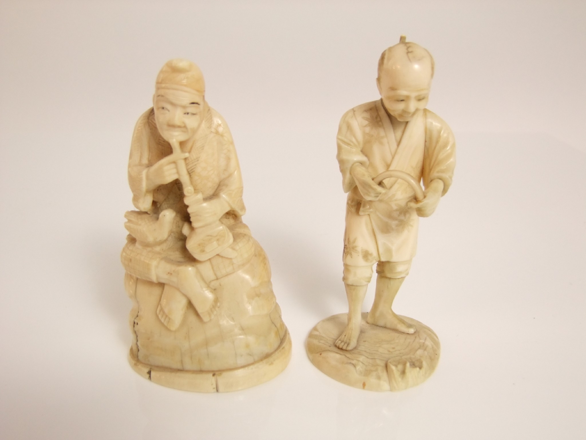 Appraisal: A late th early th century Japanese carved ivory figure