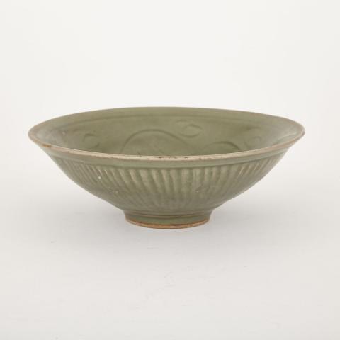 Appraisal: Longquan Bowl Qing Dynasty Heavily potted with a chrysanthemum incised