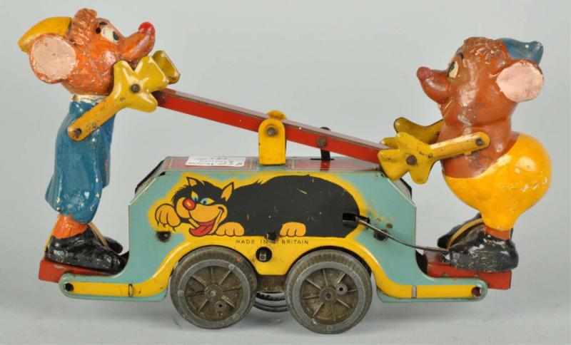 Appraisal: Wells Cinderella Handcar Wind-Up Toy Description English Tin litho car