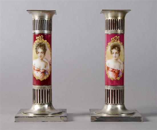 Appraisal: A Pair of Pairpoint Ceramic and Silvered Metal Candlesticks Height