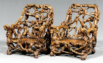 Appraisal: Pair Chinese root armchairs joined naturalistic root forms with plank