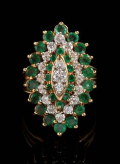 Appraisal: AN K GOLD EMERALD AND DIAMOND COCKTAIL RING The design