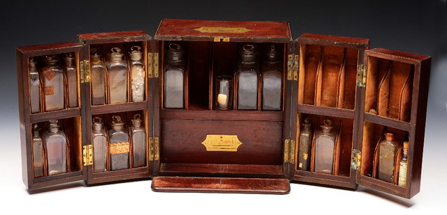 Appraisal: A LATE GEORGIAN MAHOGANY APOTHECARY'S CABINET with brass inset handle