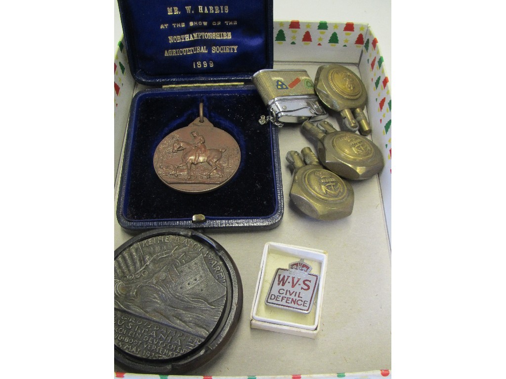 Appraisal: Box of medallions cigarette lighters and a W V S