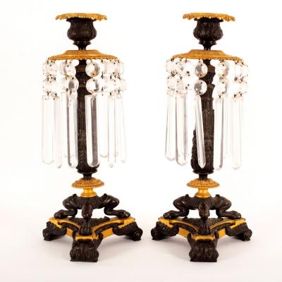 Appraisal: A pair of Empire lustre candlesticks on three leg supports