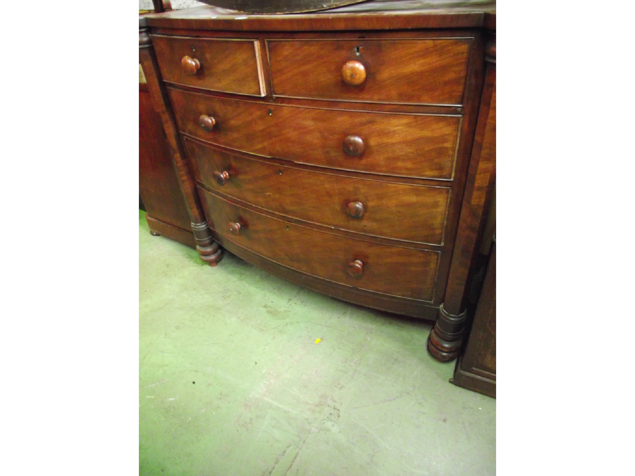 Appraisal: A large Victorian mahogany bow fronted bedroom chest of three