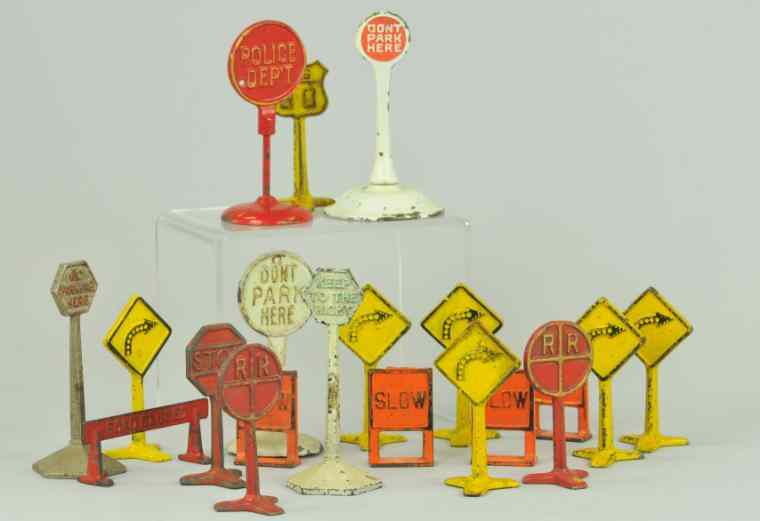 Appraisal: EXTENSIVE GROUPING OF ROAD SIGNS All done in cast iron