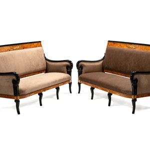 Appraisal: A Pair of Directoire Style Parcel Ebonized Burlwood Settees th