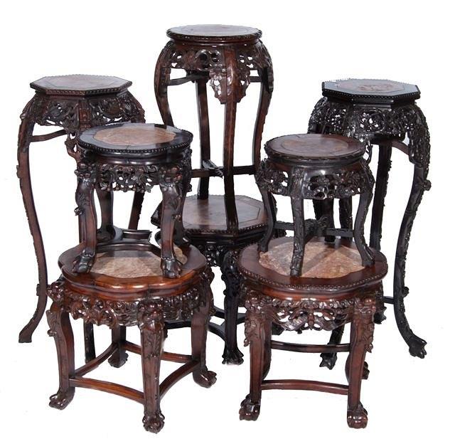 Appraisal: A CHINESE HARDWOOD OCTAGONAL STAND inset marble top with pierced