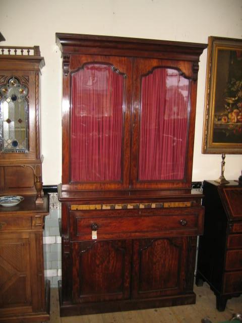 Appraisal: A VICTORIAN MAHOGANY SECRETAIRE BOOKCASE the moulded cornice over two