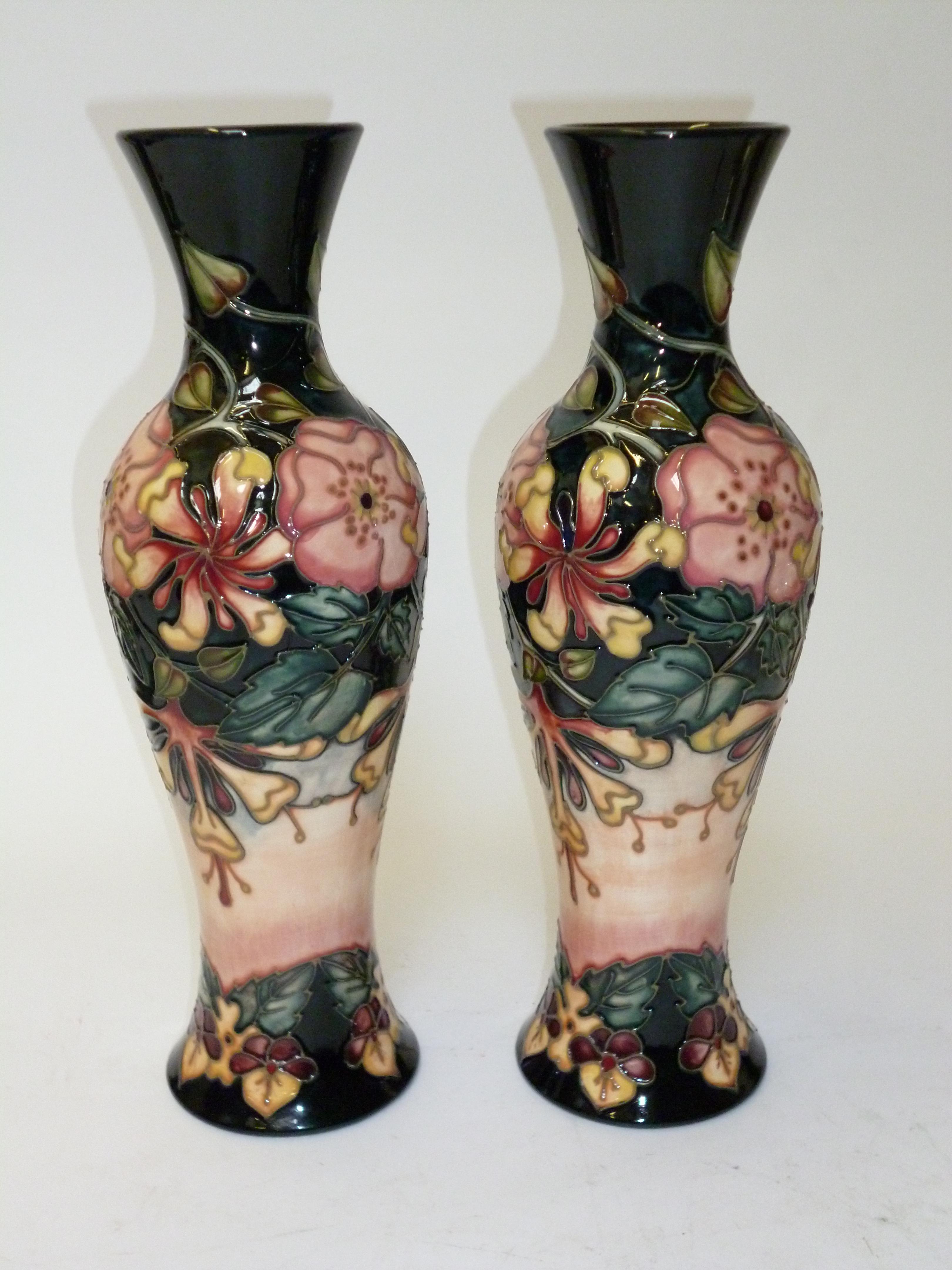 Appraisal: A PAIR OF MOORCROFT POTTERY VASES modern of slender inverted