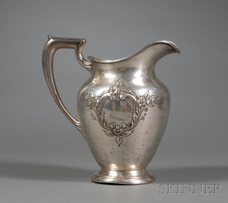 Appraisal: Wallace Sterling Water Pitcher th century ovoid with angular handle