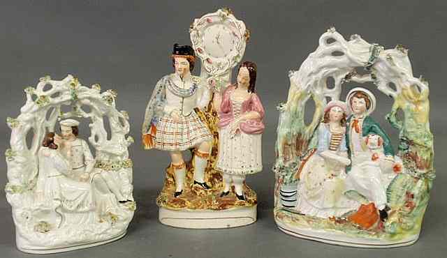 Appraisal: Three th c Staffordshire figural groups of couples h