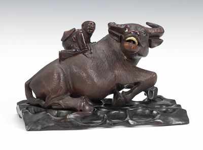 Appraisal: Carved Wood Ox with Child on Its Back With Stand