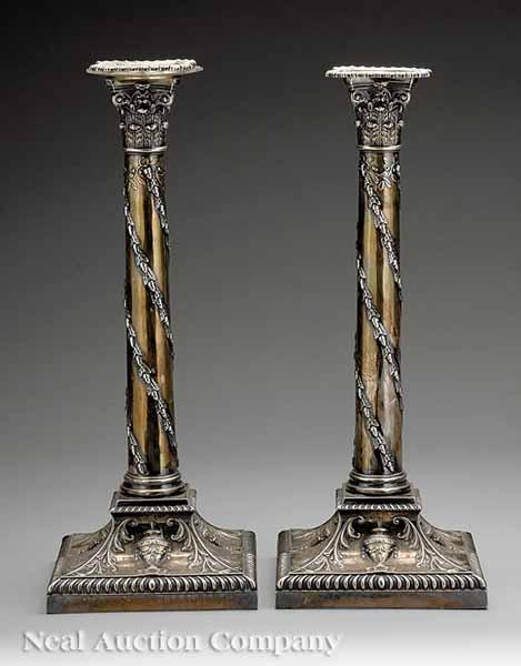 Appraisal: A Pair of Mappin Webb Silverplate Table Candlesticks c each