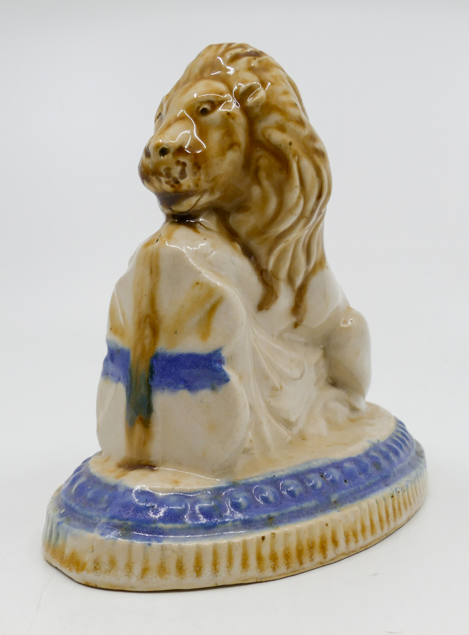 Appraisal: Old Heraldic Lion Pottery Figure ''