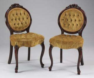 Appraisal: Pair of button Pair of Victorian style carved mahogany parlor