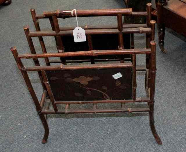 Appraisal: AN ART NOUVEAU SIMULATED BAMBOO MAGAZINE RACK with Japanoiserie lacquer