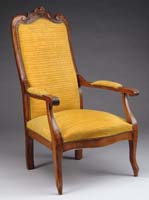 Appraisal: FRENCH WALNUT UPHOLSTERED OPEN ARMCHAIR Tall back having a carved