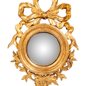 Appraisal: A Continental Carved Giltwood Convex Mirror th Century Height x