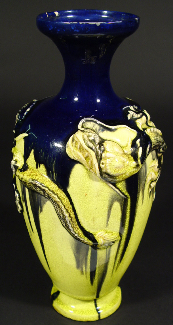 Appraisal: Oriental pottery vase relief moulded with a continuous band of