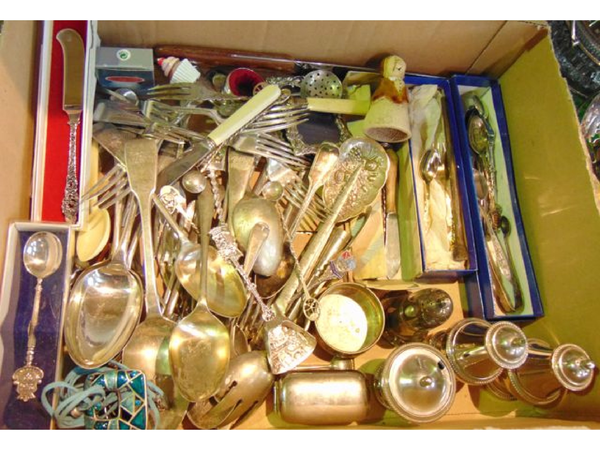 Appraisal: A box containing a mixed quantity of mostly silver plated