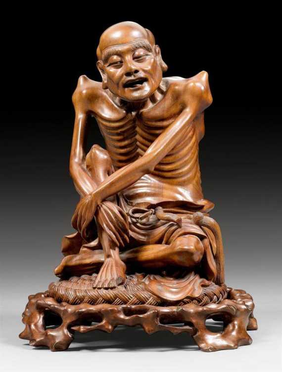 Appraisal: A FINE WOODEN FIGURE OF A SEATED ASCETIC China th