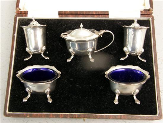 Appraisal: George V five piece silver cruet set comprising two salts