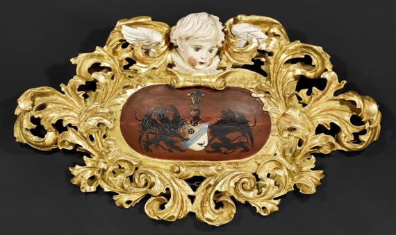 Appraisal: PAIR OF PAINTED ARMORIAL CARTOUCHES AUX ANGELOTS late Baroque German