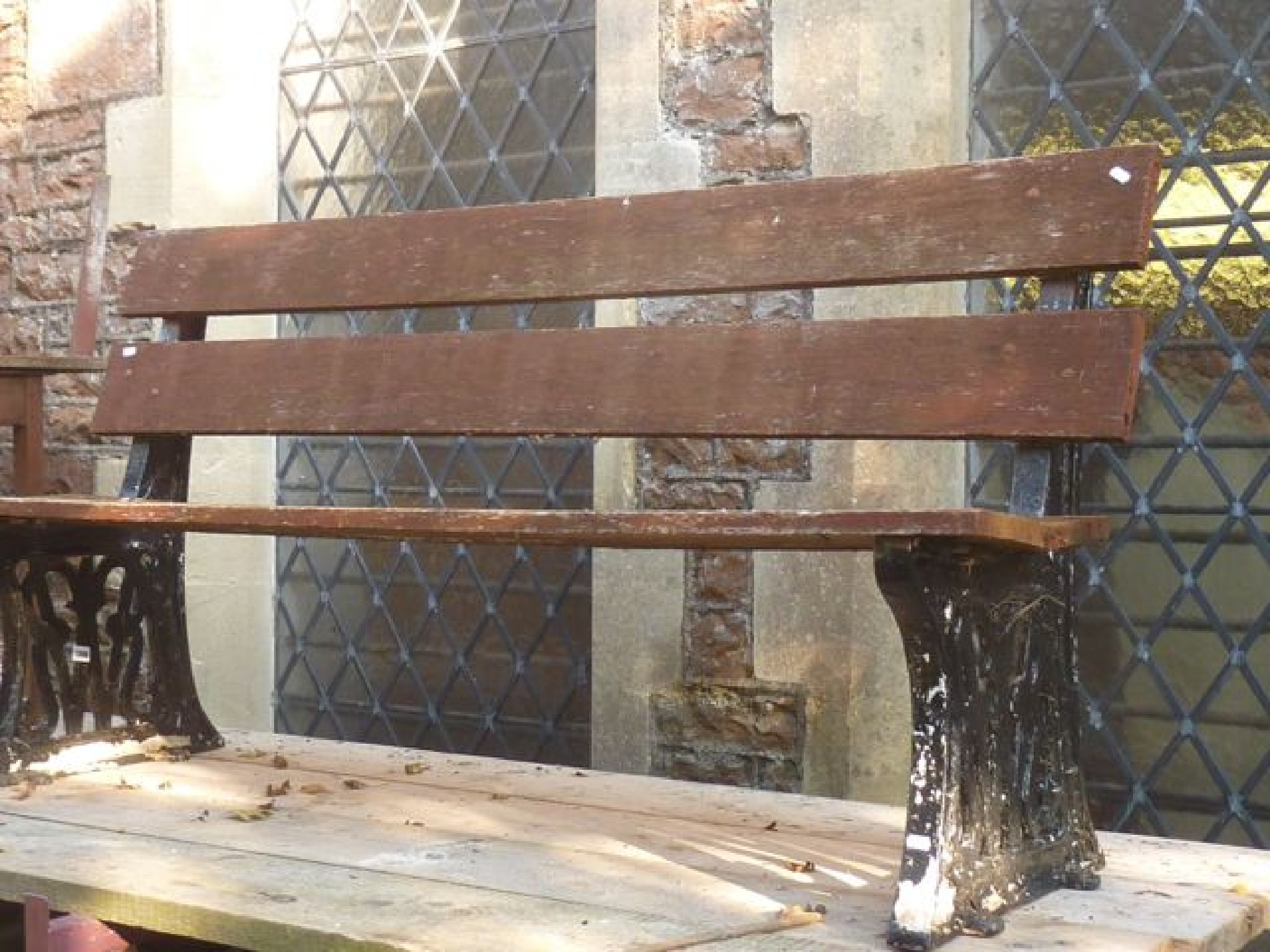 Appraisal: A reclaimed vintage railway platform bench with weathered timber slatted