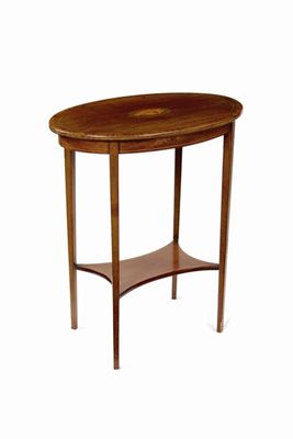 Appraisal: An Edwardian mahogany oval occasional table inlaid stringing and a