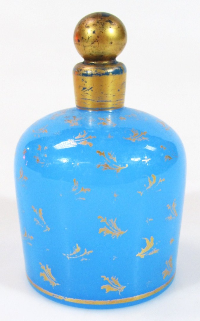 Appraisal: An early thC Continental blue glass perfume bottle partially decorated