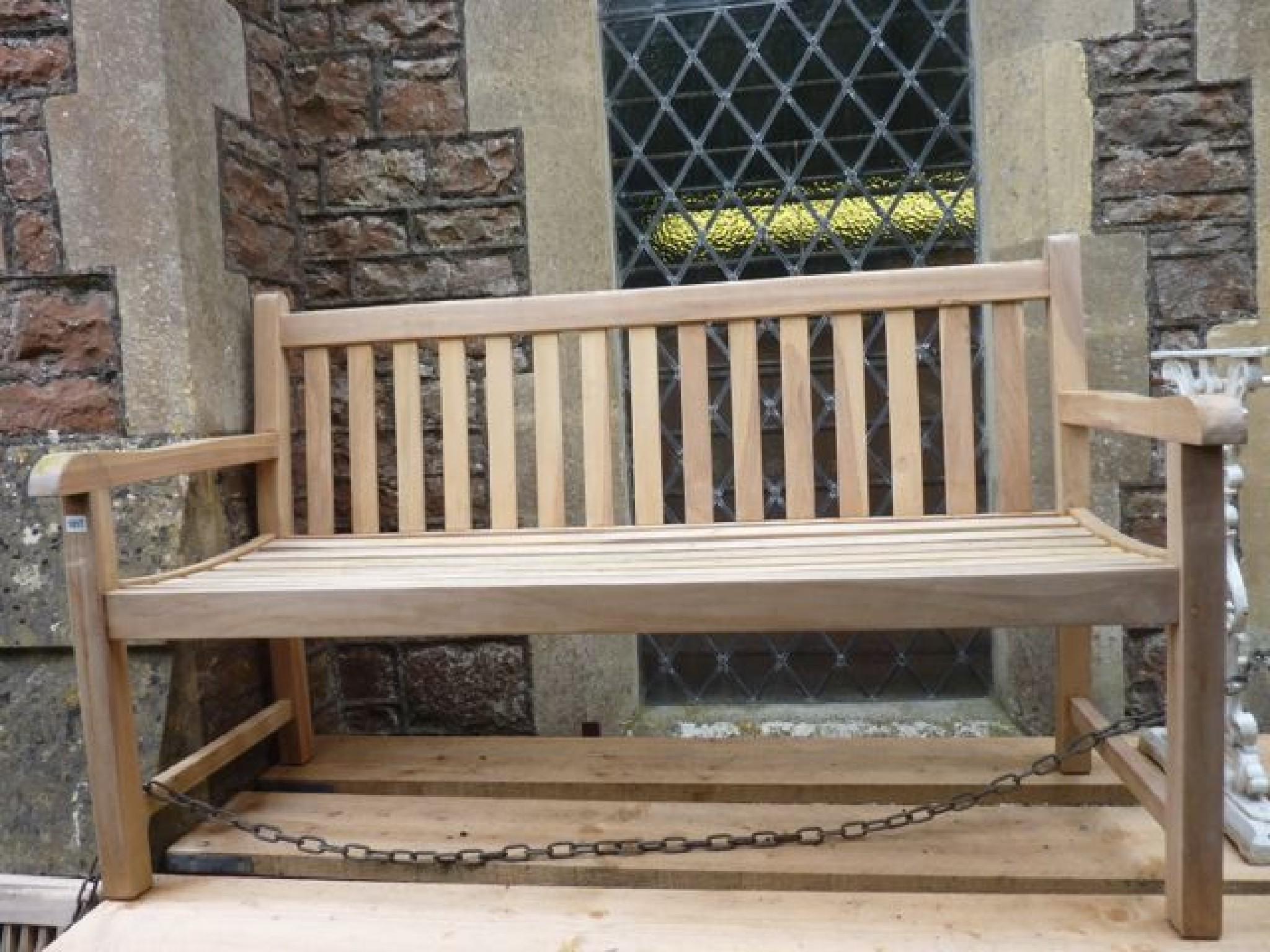 Appraisal: A contemporary teakwood three seat garden bench with slatted seat