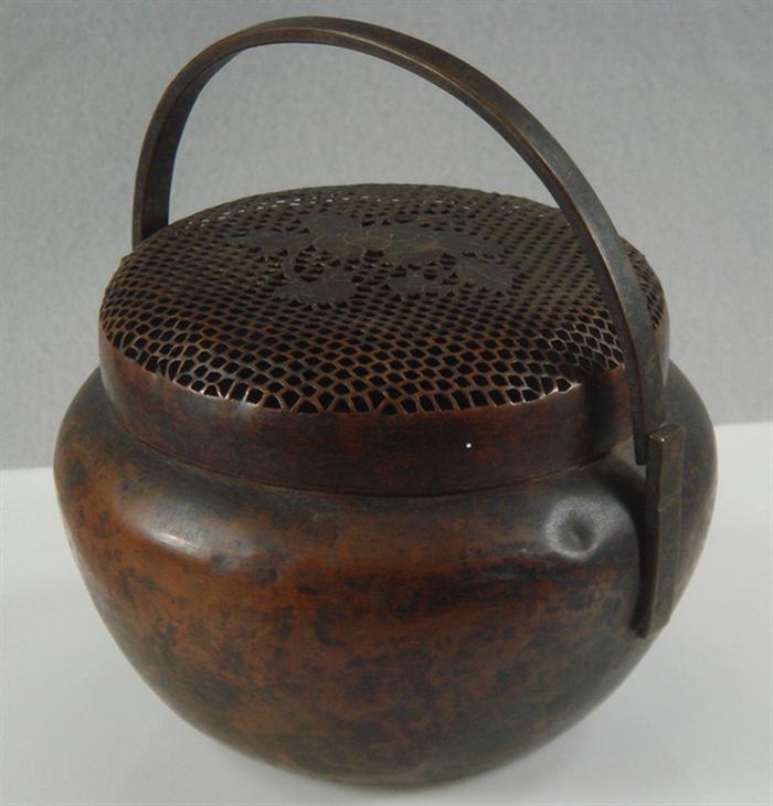 Appraisal: Japanese copper potpourri with floral engraved pierced lid swing handle