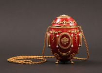 Appraisal: Vivian Alexander Classic Egg Purse This brilliant red translucent enameled