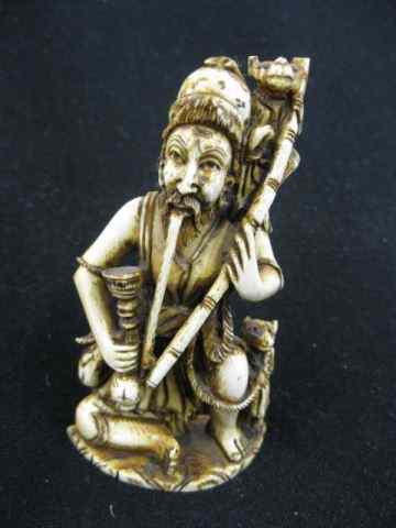 Appraisal: Carved Ivory Figurine man with pipe monkeys with him ''