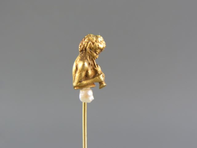 Appraisal: Antique k Gold Stickpin figural flute player with pearl