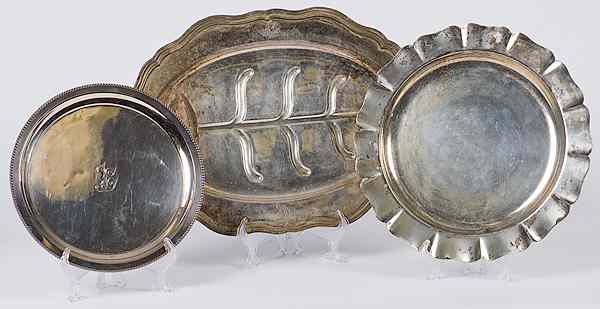 Appraisal: Silverplated Trays and Platter American three silverplated pieces includes one