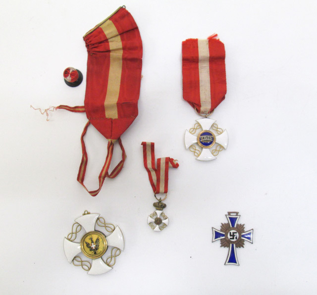 Appraisal: FOUR ENAMELED MEDALS German world war two bronze mothers cross